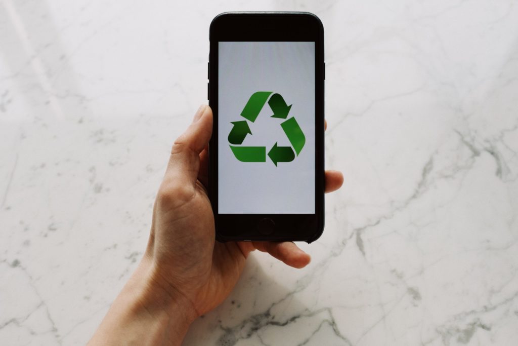Recycling icon on phone screen